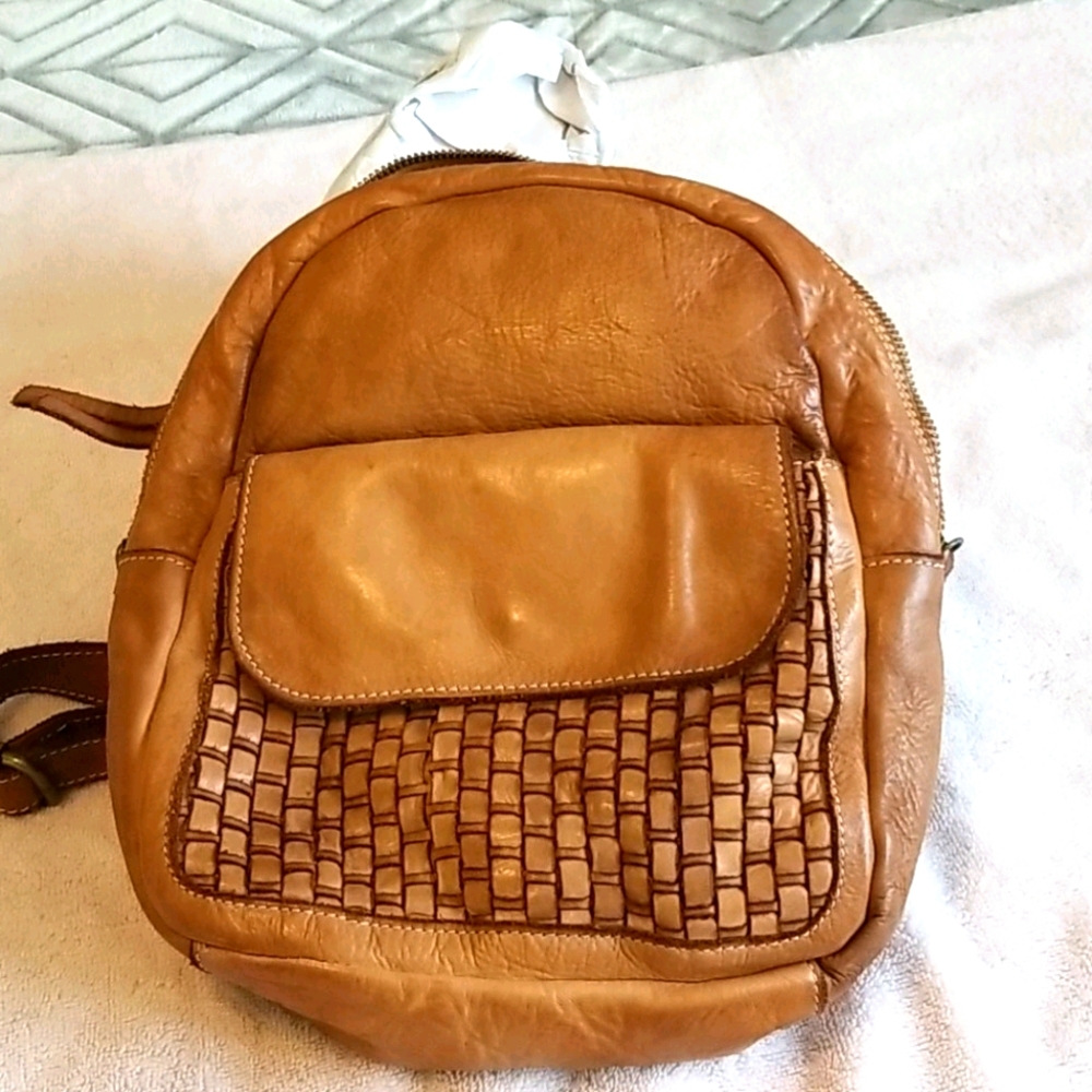Costanza Rota Vintage distressed leather backpack.